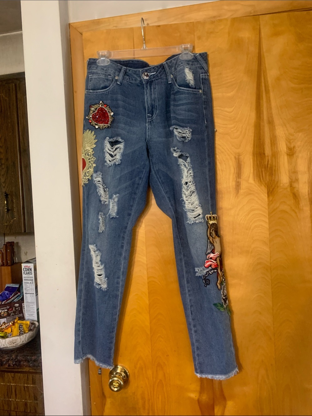 True Religion Blue Distressed Jeans with Red & Gold Heart Appliqués. Tote 4 - Picture 11 of 11